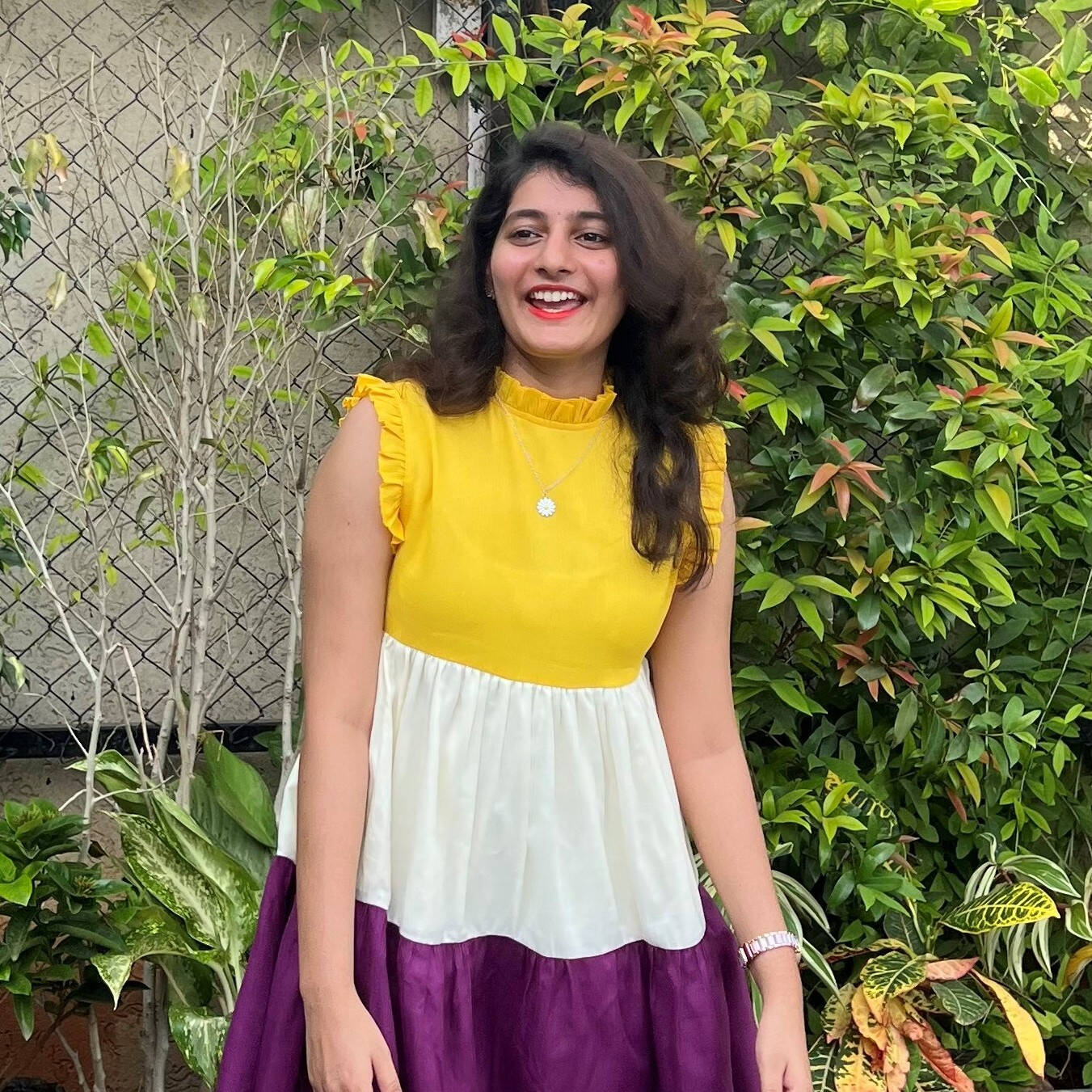 Pallavi smiles at the camera